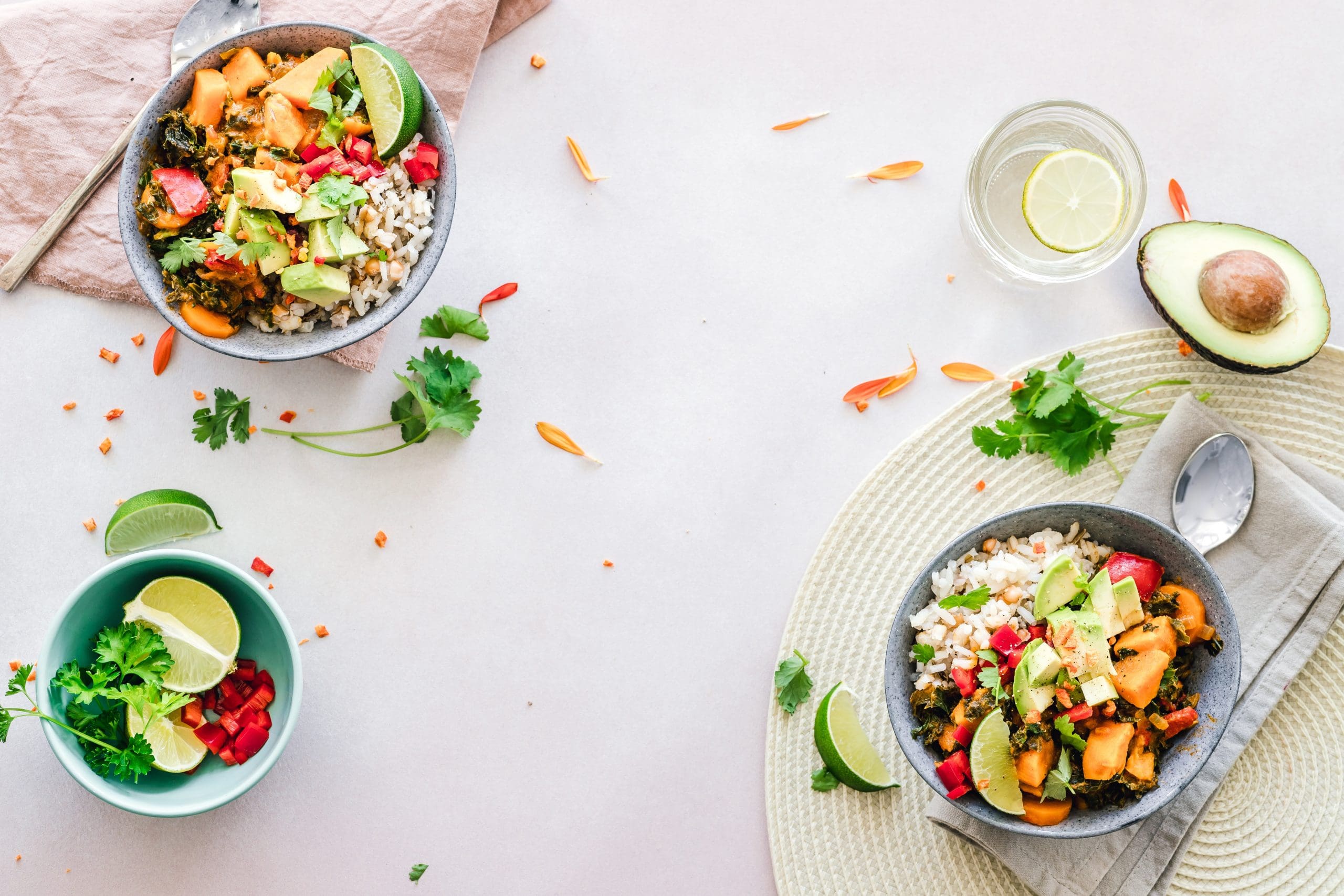a meal of heart healthy foods for seniors with avocado, greens and squash