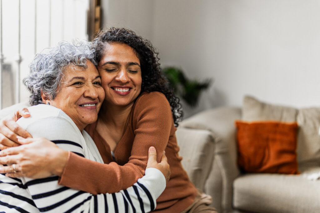 Mother and daughter embracing