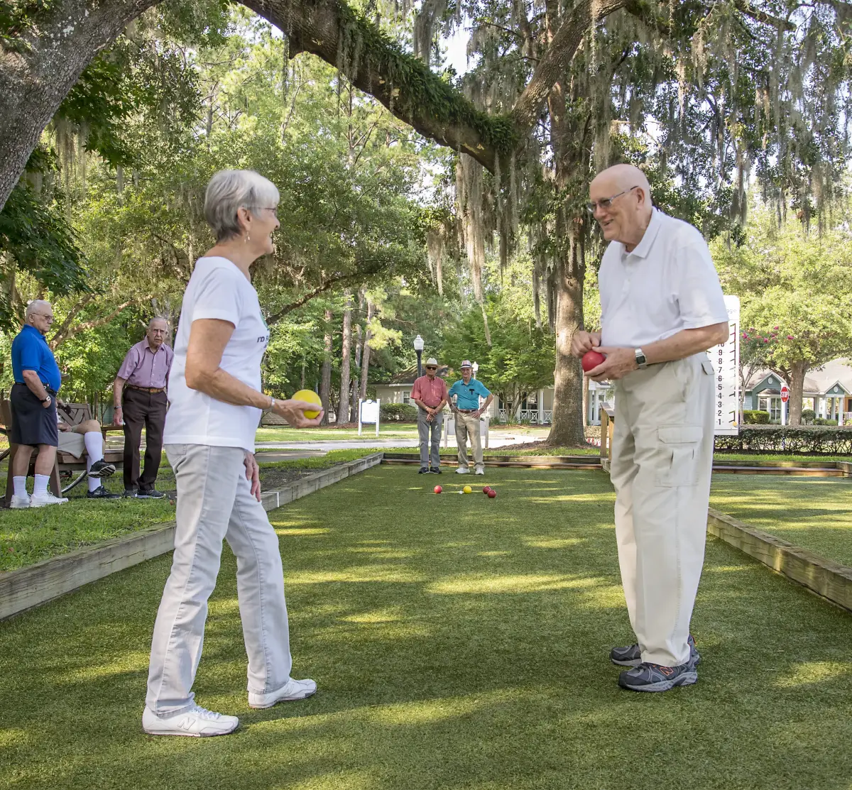 resort-cropped-2 seniors playing bocce ball at Santa Fe Gainesville senior community